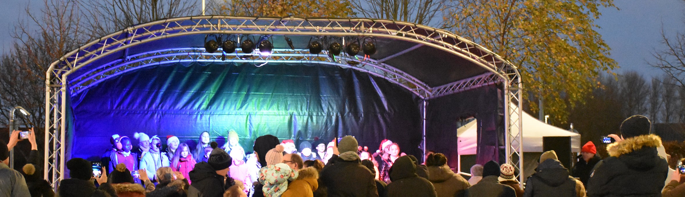 Crowds gather in front of the stage