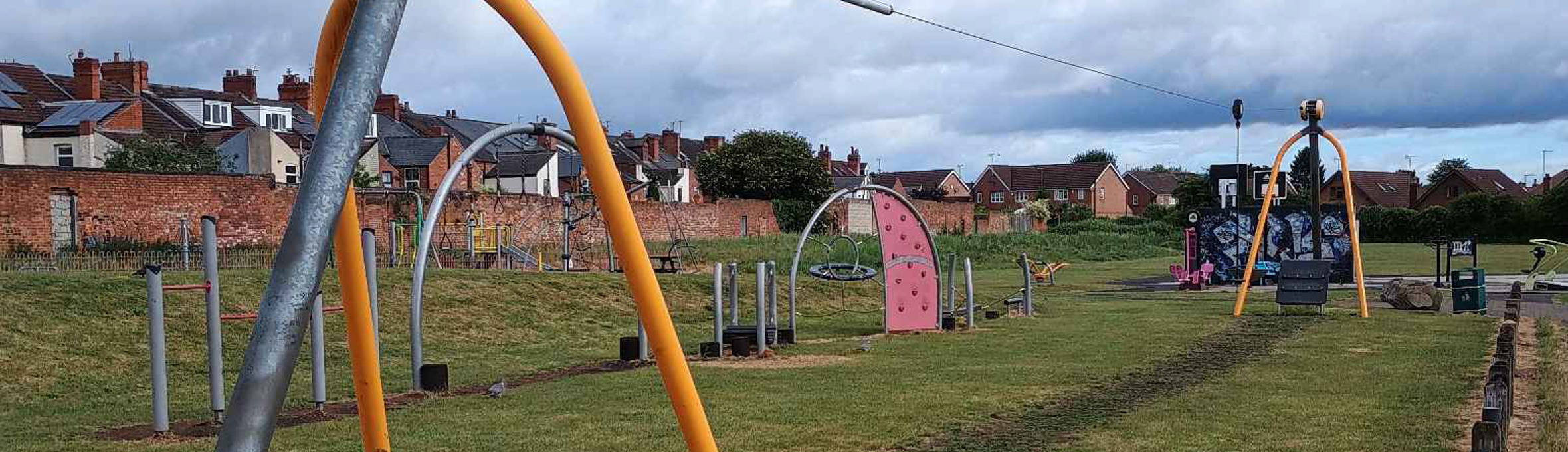 A children's play area on Albert Street Rec Ground in Hucknall, an orange cableway is pictured 