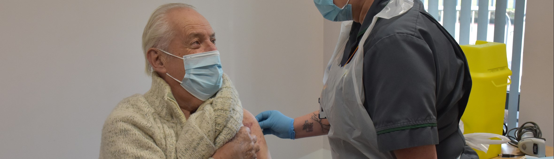Resident gets vaccine