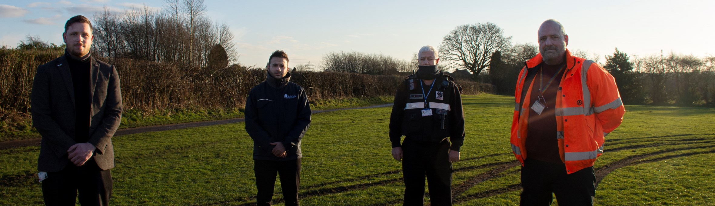 Cllr Grounds, with ADC officers on Kingsway Park, Kirkby