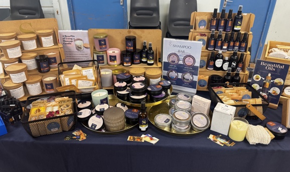 A market stall displaying a range of artisan skincare products