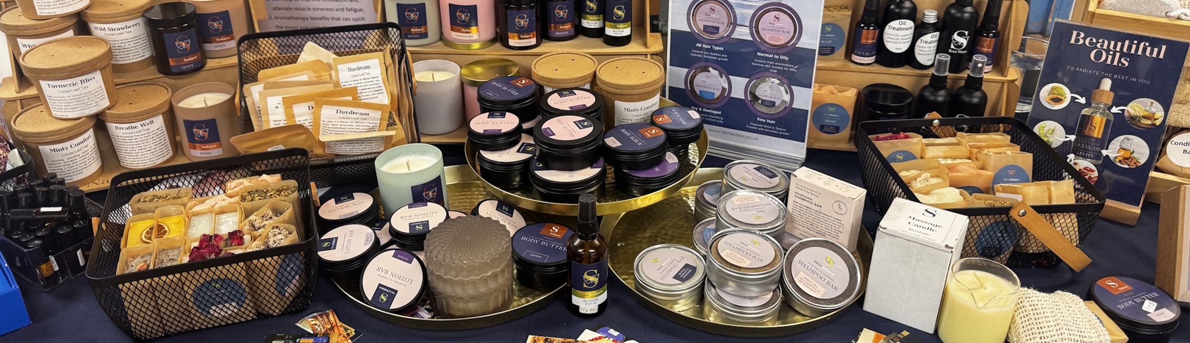 A market stall displaying a range of artisan skincare products