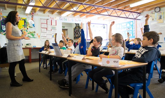 School children learning in a classroom