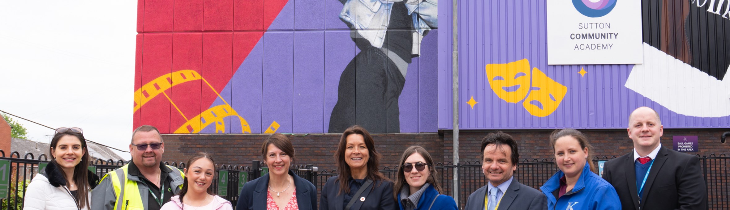 People stood outside the Cornerstone Theatre in Sutton; a project funded by the UKSPF fund.
