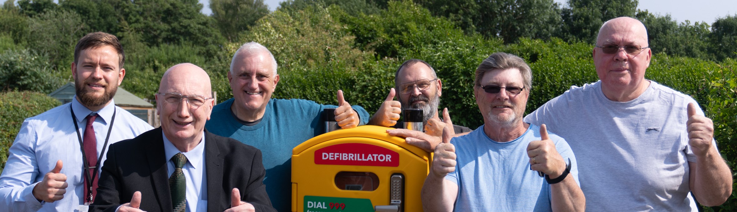 Wighay allotment holders pictured with Ashfield councillors, ADC staff and the defibrillator