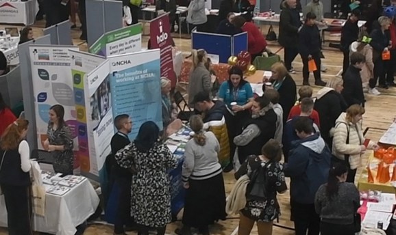 Careers Fair 2022 venue, with people visiting event stalls
