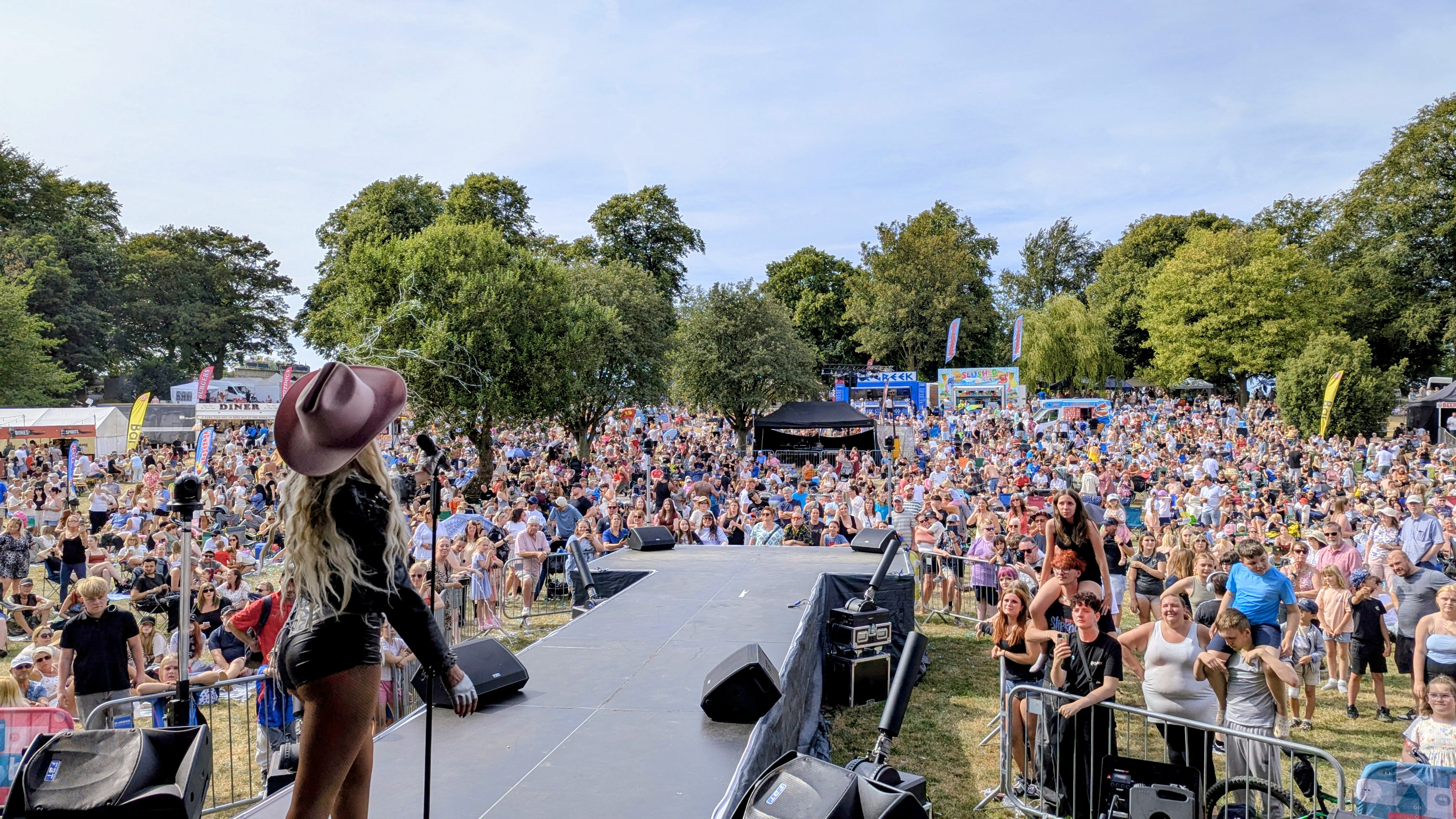 Thousands of people watch a tribute act on stage at Ashfield Show 2026
