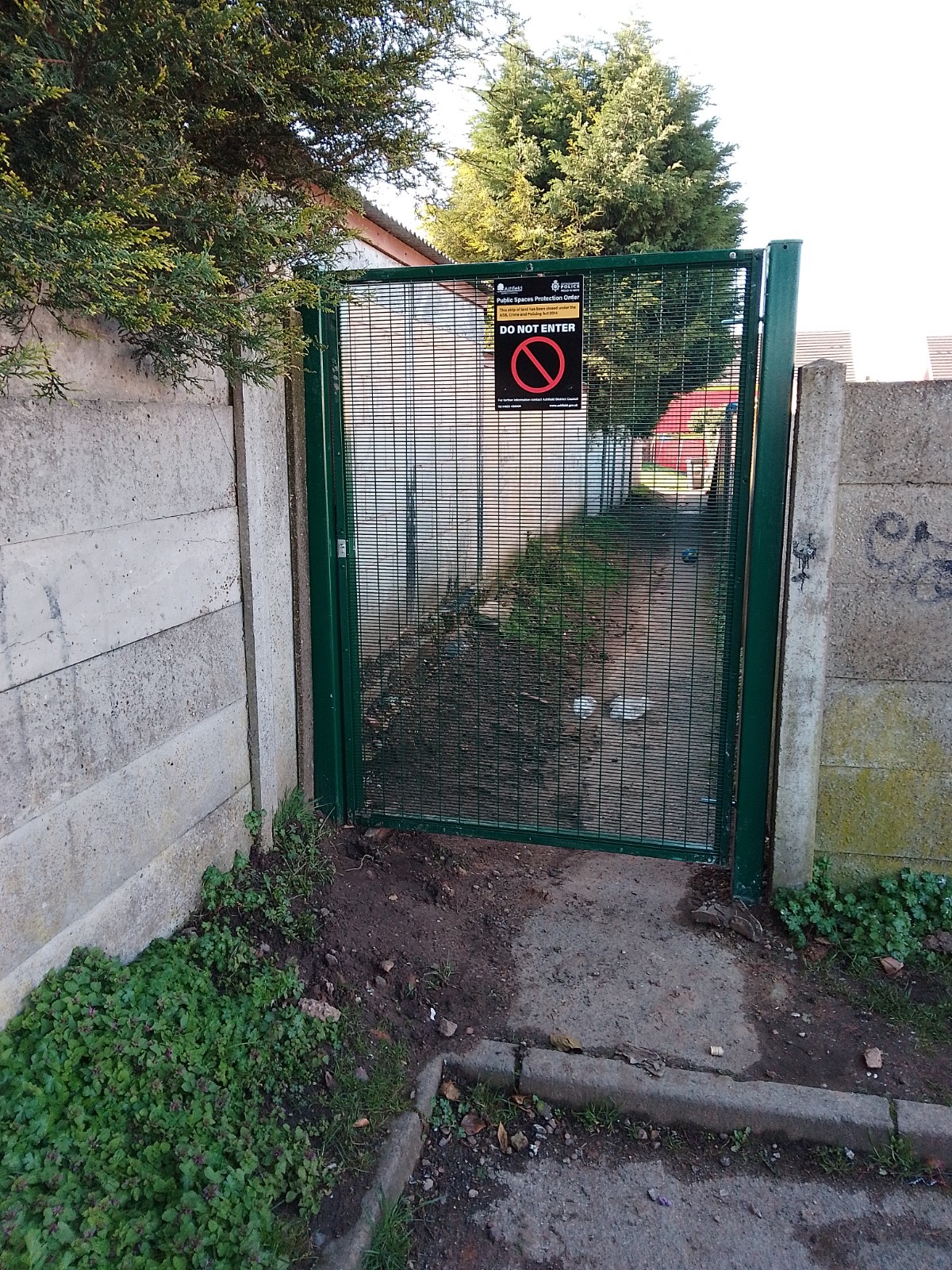 A gated alleyway in Coxmoor estate
