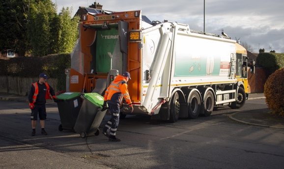 Ashfield District Council refuse collectors loading bins into a refuse truck
